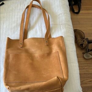 Brown Leather Tote with Minimalist Design and Roomy Silhouette